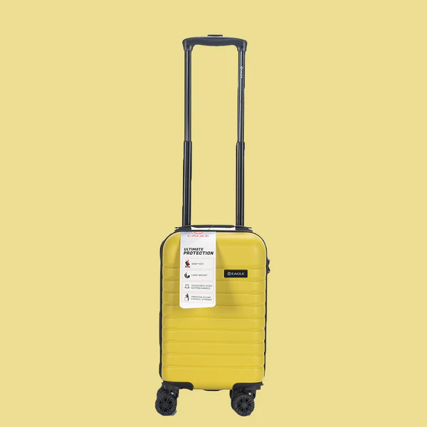 Yellow hard shell carry-on suitcase with four wheels and telescopic handle on beige background+2